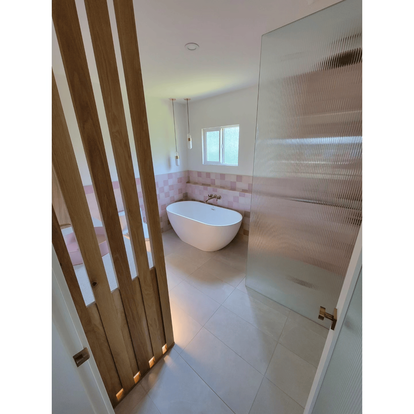https://www.timberwolfcarpentry.com/wp-content/uploads/2023/11/add-to-bathroom-area-of-photos-2.png